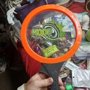 paddle from the Koosh Double Paddle Playset, designed for bouncing a soft Koosh